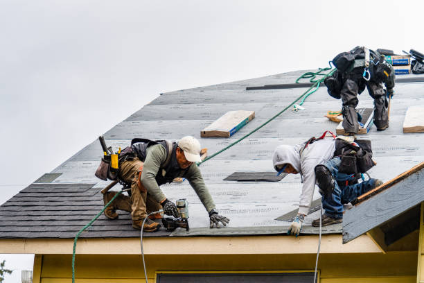 Professional Flat Roof Repair technician working in Pacific, WA